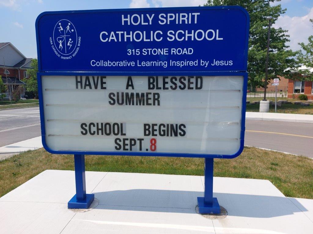 Holy Spirit Catholic School road graph sign